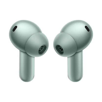 Zen Green | OnePlus Buds 4 Zen Green earbuds, close-up of silicone ear tips and microphones
